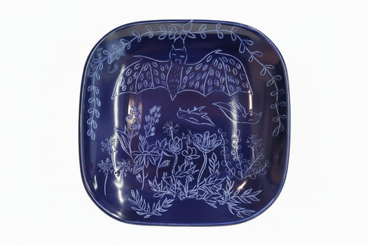 Assiette bleue chauve-souris