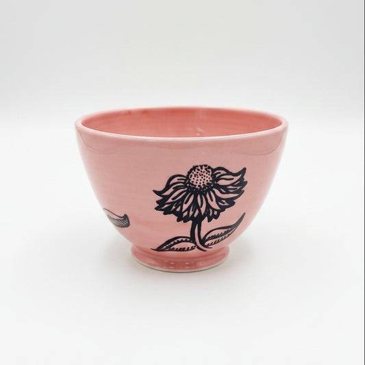 Bol rose avec fleurs noires