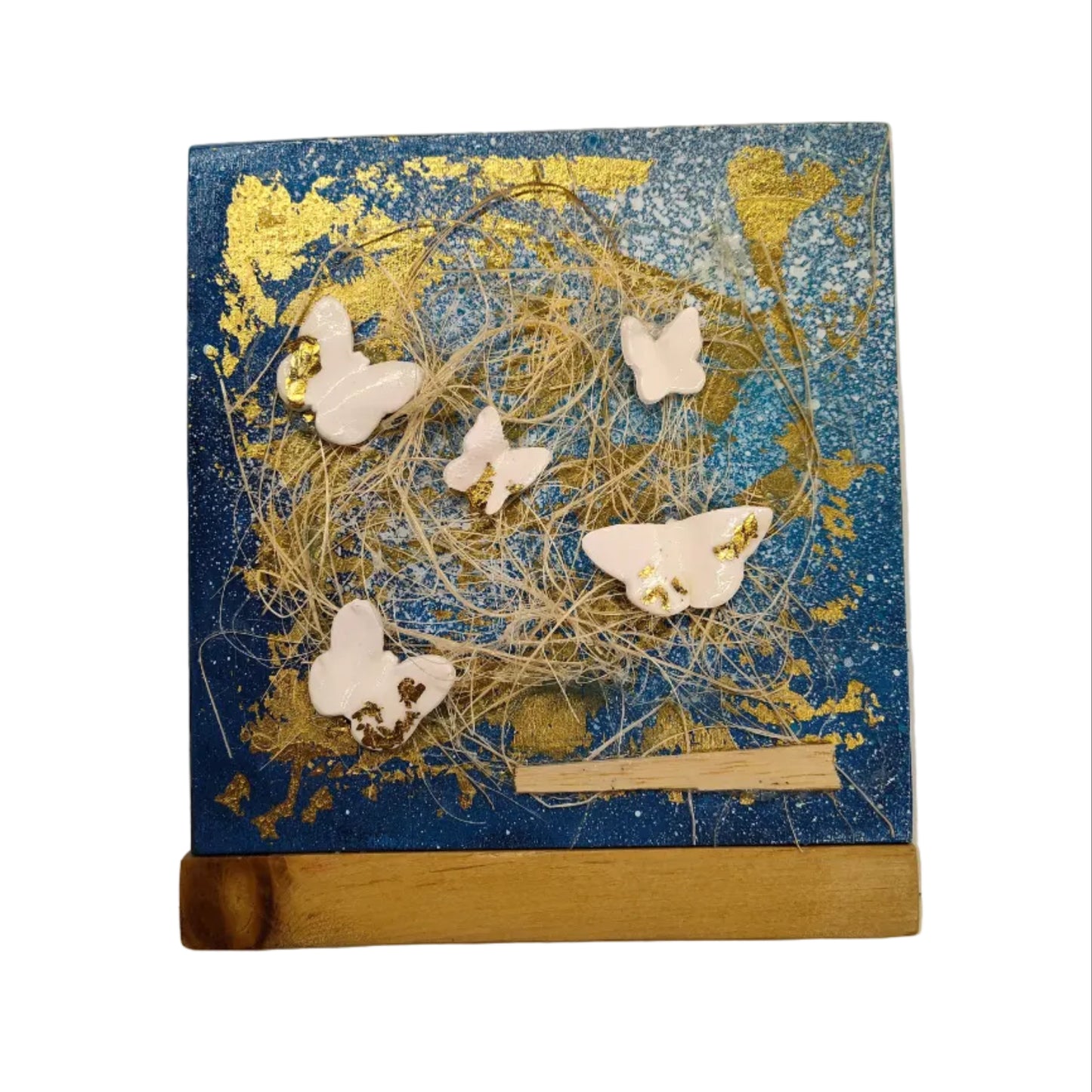 Cadre en bois avec papillons de céramique