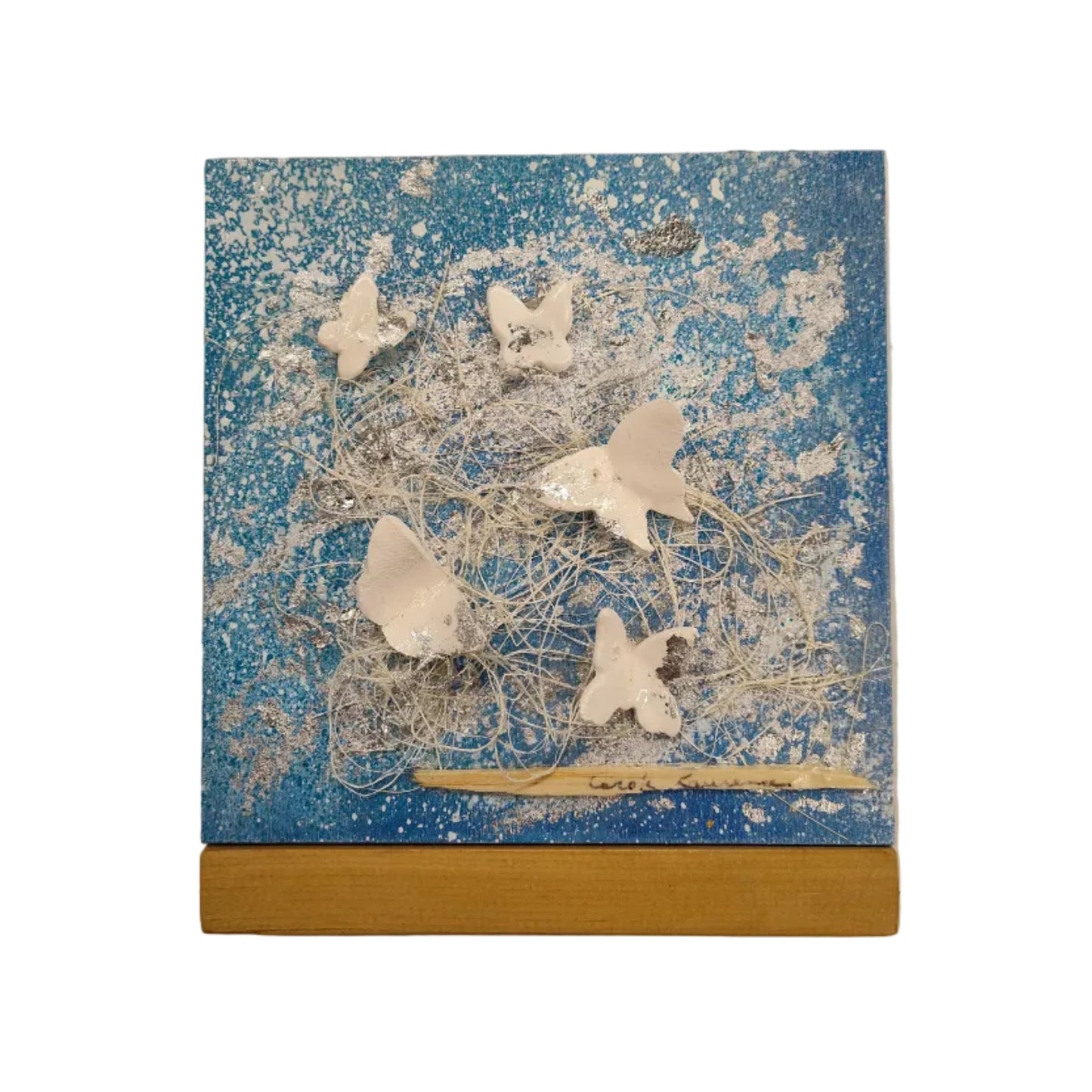 Cadre en bois avec papillons de céramique