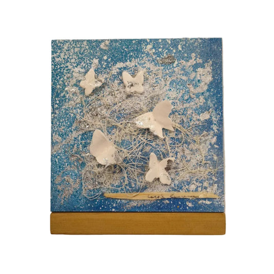 Cadre en bois avec papillons de céramique